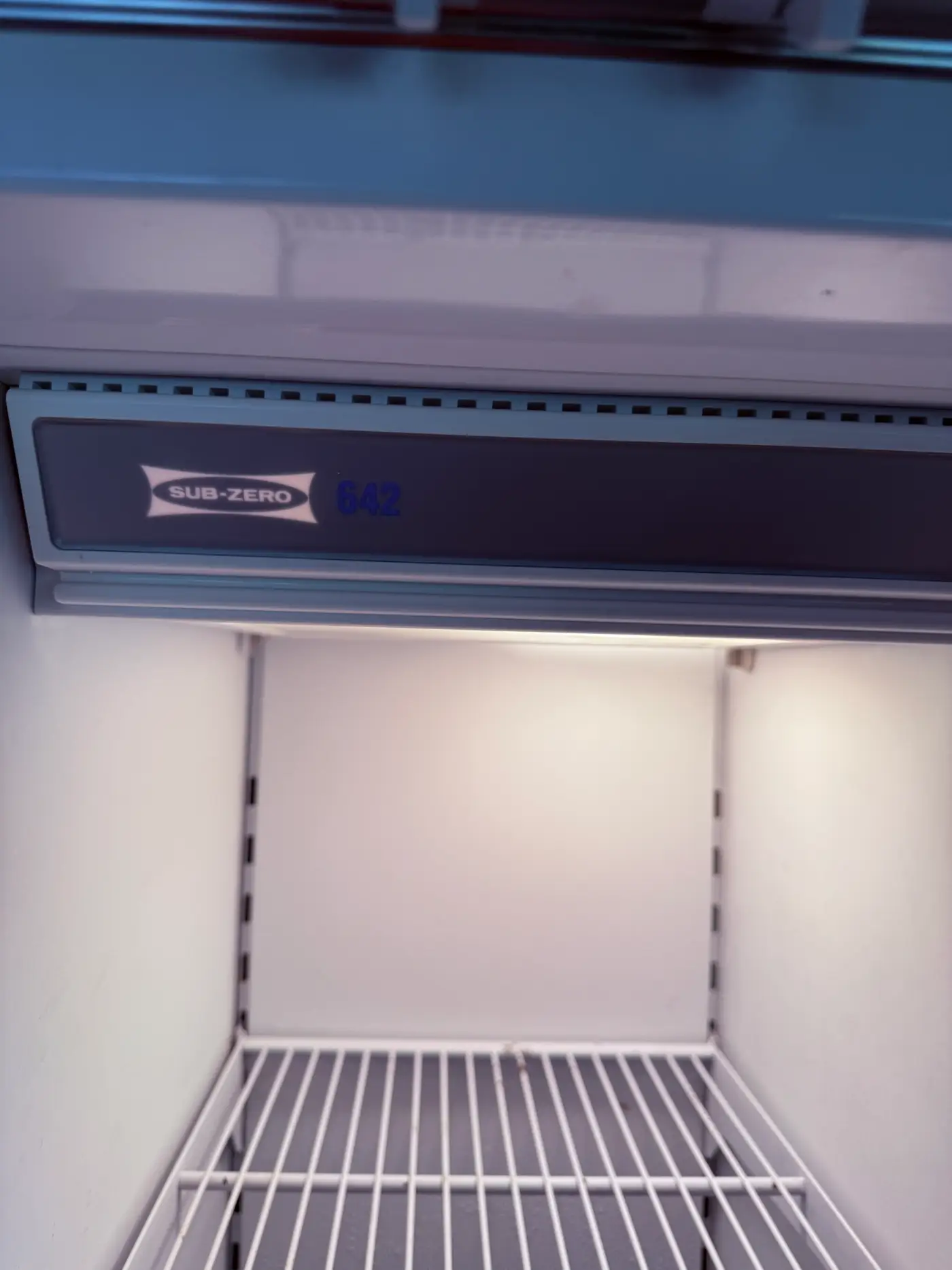 Sub-Zero 642 model badge inside the refrigerator compartment